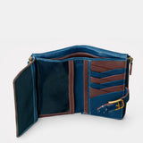 Große Damenbörse aus blauem Leder.