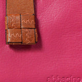 Cartera pequeña de mujer en piel fucsia