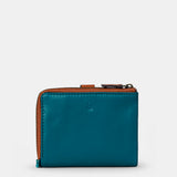 Cartera pequeña de mujer en piel azul