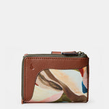 Cartera pequeña de mujer en piel estampada