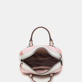 Damentasche aus recyceltem rosa Stoff.