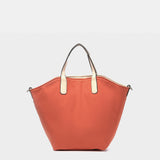 Umhängetasche für Damen, wendbar in Orange.