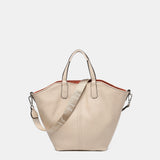 Umhängetasche für Damen, wendbar in Orange.