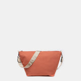 Umhängetasche für Damen, wendbar in Orange.