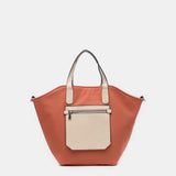 Umhängetasche für Damen, wendbar in Orange.