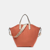 Umhängetasche für Damen, wendbar in Orange.