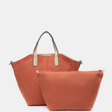 Umhängetasche für Damen, wendbar in Orange.