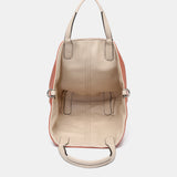 Umhängetasche für Damen, wendbar in Orange.