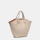 Umhängetasche für Damen, wendbar in Orange.