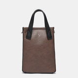 Bolso de mano de tweed en marrón