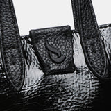 Schwarze Lackhandtasche