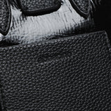 Schwarze Lackhandtasche