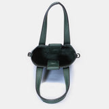 Patent leather handbag in green
