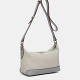 Bandolera en materiales reciclados en gris