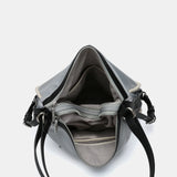 Tasche - Rucksack aus grauem Recyclingmaterial.