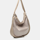 Tasche - Rucksack aus recyceltem beigem Material.