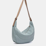 Shoulder bag in recycled and padded materials, blue