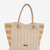 Strandtasche mit gelbem Muster.