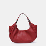 Red recycled materials handbag