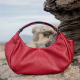 Red recycled materials handbag