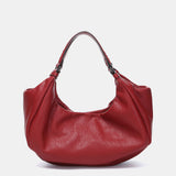 Red recycled materials handbag