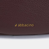 Bolso de hombro en materiales reciclados burdeos