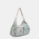 Umhängetasche aus blauem Stoff