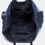 Blau gestreifte Bast-Tragetasche