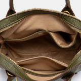 Bolso de mano trenzado verde
