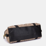 Taupe quilted handbag.
