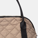 Taupe quilted handbag.