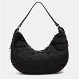Black quilted shoulder bag.