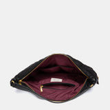 Black quilted shoulder bag.
