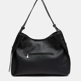 Bolso de hombro con borla negro