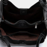 Bolso de hombro con borla negro