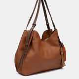 Bolso de hombro con borla cognac