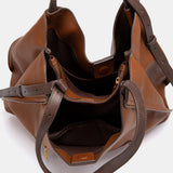 Bolso de hombro con borla cognac