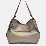 Bolso de hombro con borla ocre