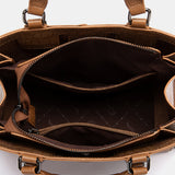 Cognac handbag.