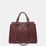 Burgundy handbag.
