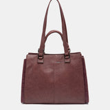 Burgundy handbag.