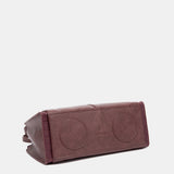 Burgundy handbag.