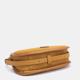 Bandolera en materioales reciclados ámbar