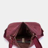 Bolso multifuncional en materiales reciclados burdeos