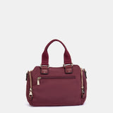 Bolso de mano en materiales reciclados burdeos