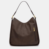 Brown recycled materials shoulder bag.