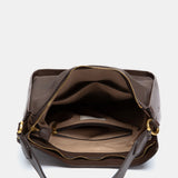 Brown recycled materials shoulder bag.