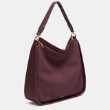 Burgundy shoulder bag made from recycled materials.