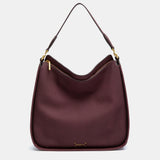 Burgundy shoulder bag made from recycled materials.