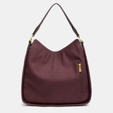 Burgundy shoulder bag made from recycled materials.